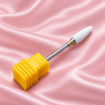 Extra fine tornado ceramic nail drill bit in yellow holder with tapered cutting head